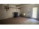 Garage with a utility sink, door to the yard, and room for storage at 806 Arlington Rd, Palmetto, FL 34221