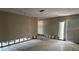 Bright living area with natural light from the front door, awaiting complete renovation at 806 Arlington Rd, Palmetto, FL 34221