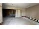 Spacious living room with partial wall and sliding doors, ready to be renovated at 806 Arlington Rd, Palmetto, FL 34221