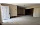 Open living room area with door to outside, ready for renovation and personal design at 806 Arlington Rd, Palmetto, FL 34221