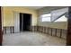 Spacious living room area featuring a sliding glass door and large window at 806 Arlington Rd, Palmetto, FL 34221