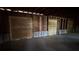 Interior space featuring exposed beams and boarded up walls at 806 Arlington Rd, Palmetto, FL 34221