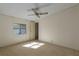 Spacious bedroom with carpeting, a ceiling fan, and ample natural light at 8411 Regal Way, Palmetto, FL 34221