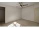 Spacious bedroom with carpeting, ceiling fan, and ample natural light at 8411 Regal Way, Palmetto, FL 34221