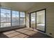 Spacious enclosed porch with sliding glass doors opening to the interior living space at 8411 Regal Way, Palmetto, FL 34221