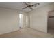Large main bedroom with ensuite access, ceiling fan, and neutral decor at 8411 Regal Way, Palmetto, FL 34221