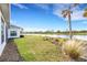 Peaceful backyard view overlooking a serene lake at 8921 Artisan Way, Sarasota, FL 34240