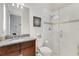 Modern bathroom with glass shower and granite at 8921 Artisan Way, Sarasota, FL 34240