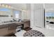 Elegant bathroom with double vanity, soaking tub, and walk-in shower at 8921 Artisan Way, Sarasota, FL 34240