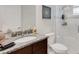 Modern bathroom with granite vanity, updated fixtures, and a glass shower at 8921 Artisan Way, Sarasota, FL 34240