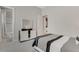 Bedroom with ensuite bathroom and modern dresser at 8921 Artisan Way, Sarasota, FL 34240