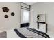 Bright bedroom with stylish dresser and bedding at 8921 Artisan Way, Sarasota, FL 34240