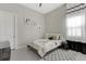 Charming bedroom with Parisian-themed bedding at 8921 Artisan Way, Sarasota, FL 34240