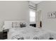 Elegant bedroom with ensuite bathroom access at 8921 Artisan Way, Sarasota, FL 34240