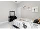 Cozy bedroom with Parisian decor and dresser at 8921 Artisan Way, Sarasota, FL 34240