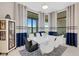 Elegant dining room overlooking water views at 8921 Artisan Way, Sarasota, FL 34240
