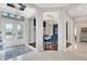 Elegant entryway offering views of formal dining room and living areas at 8921 Artisan Way, Sarasota, FL 34240