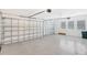 Bright and clean garage with automatic door and additional storage at 8921 Artisan Way, Sarasota, FL 34240