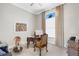 Home office with built-in desk and large window at 8921 Artisan Way, Sarasota, FL 34240