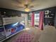 bedroom with bunk beds, a desk, and playful decor at 779 Nectar Rd, Venice, FL 34293