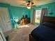 Bedroom featuring a bed, desk, and chair near the window at 779 Nectar Rd, Venice, FL 34293