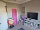 bedroom with playful decor, a TV, and ample storage at 779 Nectar Rd, Venice, FL 34293