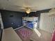 A cozy bedroom with bunk beds and ample storage at 779 Nectar Rd, Venice, FL 34293