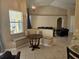 Built-in breakfast nook with a round table and cushioned seating at 779 Nectar Rd, Venice, FL 34293