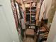 Walk-in closet with ample storage space, shelving, and hanging rods at 779 Nectar Rd, Venice, FL 34293