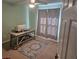 Bright home office space with a desk, chair, and window at 779 Nectar Rd, Venice, FL 34293