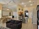 Open living area with breakfast nook, kitchen with granite countertops, and view of the dining area at 779 Nectar Rd, Venice, FL 34293