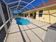 Screened-in pool with a patio area, perfect for outdoor relaxation at 779 Nectar Rd, Venice, FL 34293