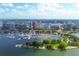 High-rise condos, marina, and park with a city skyline in the background at 101 S Gulfstream Ave # 15E, Sarasota, FL 34236