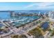 Aerial view of waterfront community with a marina and bridge at 101 S Gulfstream Ave # 15E, Sarasota, FL 34236