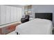 Comfortable bedroom with a queen-size bed and relaxing chair at 101 S Gulfstream Ave # 15E, Sarasota, FL 34236