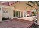 The 101 Condominium entrance features a covered walkway, double doors, and a brick-paved area at 101 S Gulfstream Ave # 15E, Sarasota, FL 34236