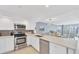 Bright kitchen with stainless steel appliances and white cabinetry at 101 S Gulfstream Ave # 15E, Sarasota, FL 34236
