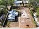 Aerial view of a quaint home with a large yard at 1016 38Th W St, Bradenton, FL 34205