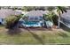 Aerial view of the home, pool and backyard at 10555 Old Grove Cir, Bradenton, FL 34212