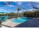 Inviting pool and patio area with screened enclosure at 10555 Old Grove Cir, Bradenton, FL 34212