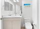 Small bathroom with toilet, vanity, and bidet at 108 Corte Del Rosa, Venice, FL 34285