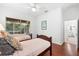 Guest bedroom with two twin beds and access to a bathroom at 108 Corte Del Rosa, Venice, FL 34285