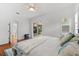 Main bedroom with access to backyard and fireplace at 108 Corte Del Rosa, Venice, FL 34285