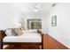 Guest bedroom with two twin beds and access to the patio at 108 Corte Del Rosa, Venice, FL 34285