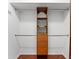 Well-organized closet with double hanging rods and drawers at 108 Corte Del Rosa, Venice, FL 34285