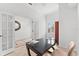 Home office with a desk and access to another room at 108 Corte Del Rosa, Venice, FL 34285
