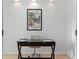 Bright home office with a desk and seating at 108 Corte Del Rosa, Venice, FL 34285