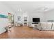 Bright living room featuring comfortable seating and tile floors at 108 Corte Del Rosa, Venice, FL 34285
