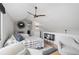 Cozy bedroom with two beds and stylish decor at 109 Woodland Pl, Osprey, FL 34229