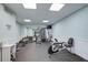 Well-equipped fitness room with a variety of exercise equipment at 109 Woodland Pl, Osprey, FL 34229